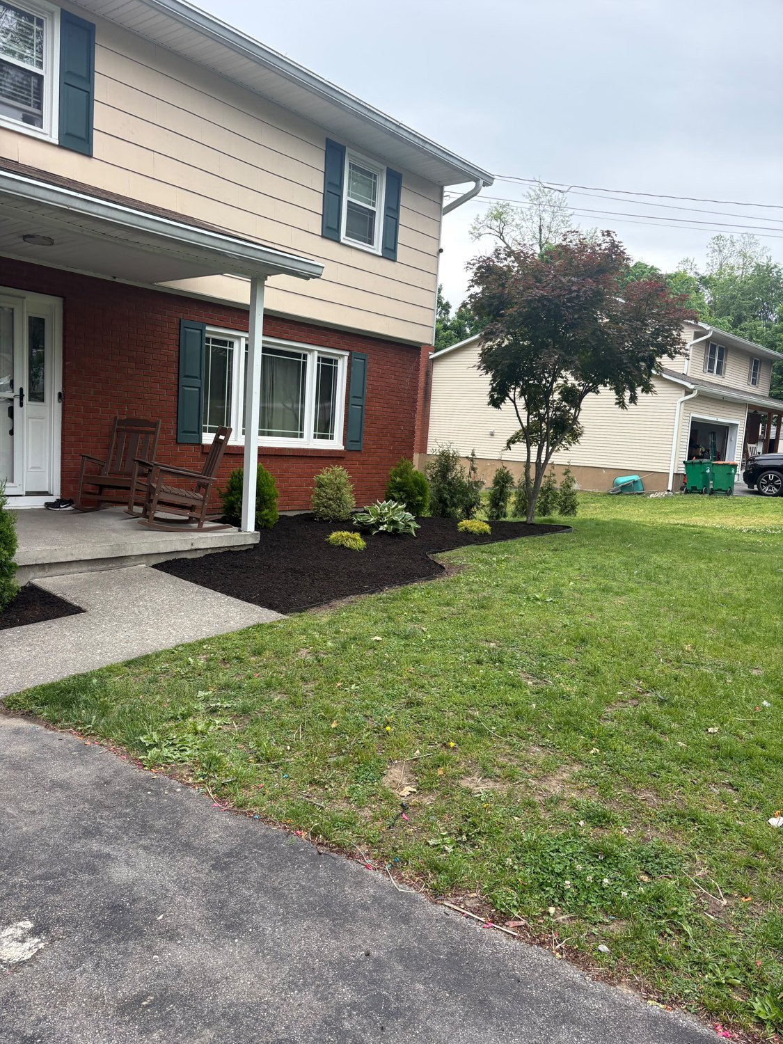Lawn care beside a home